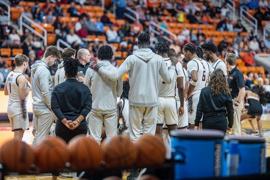 Men's Basketball Team Huddle